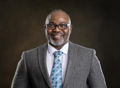 Dr. Scott Ighavongbe-Patrick
